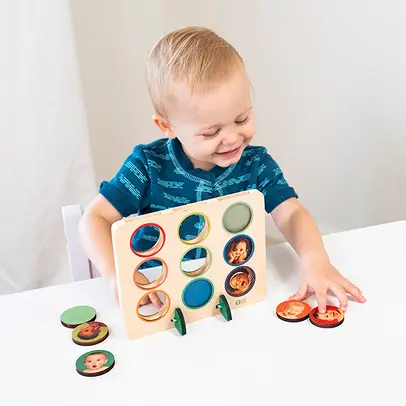 Preschooler building core skills with a KiwiCo classroom kit.