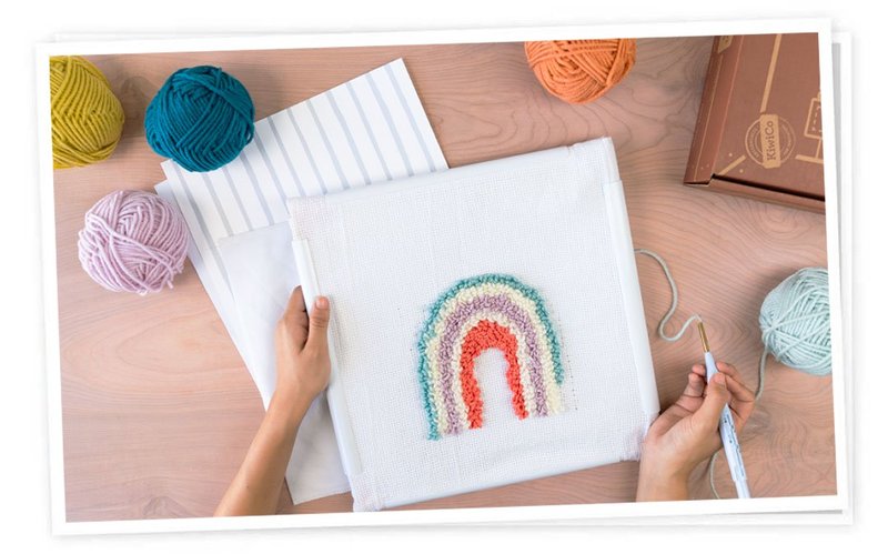 Artist designing a punch needle pillow from Maker Crate monthly craft box