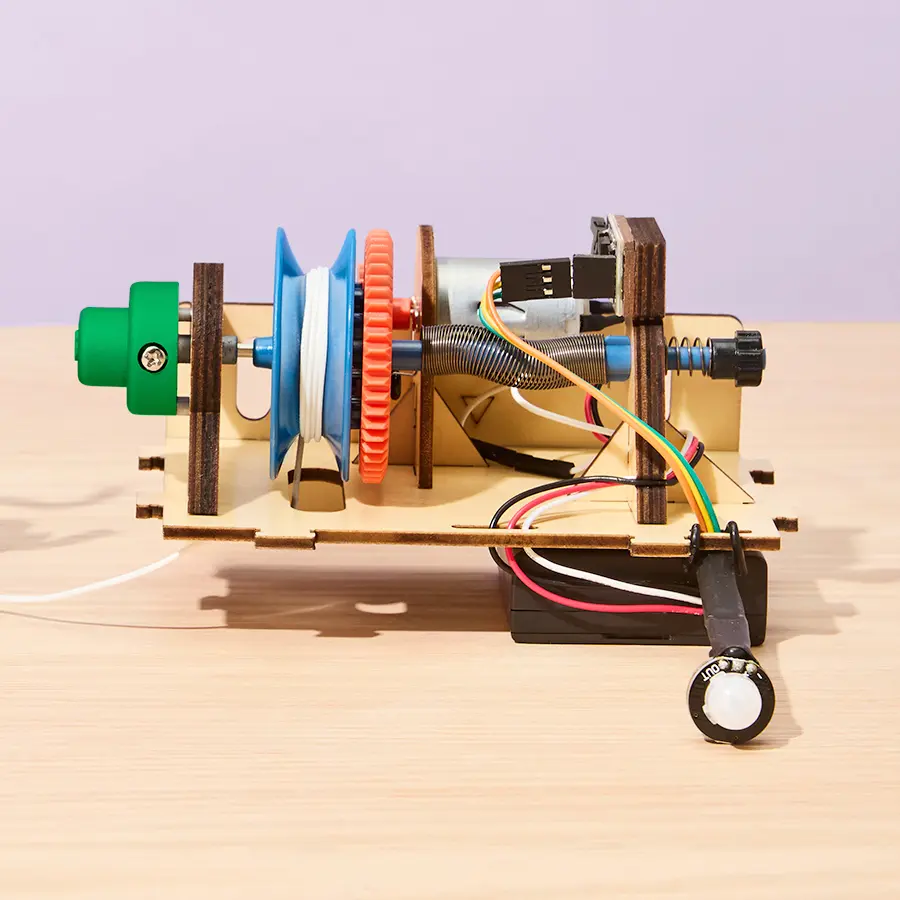 inside motor and gears of motion-sensing spider